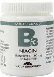 A bottle of Natur Drogeriet brand Niacin (Vitamin B3) dietary supplement tablets with text in Danish, indicating a dosage of 30 mg of nicotinamide and a quantity of 50 tablets.